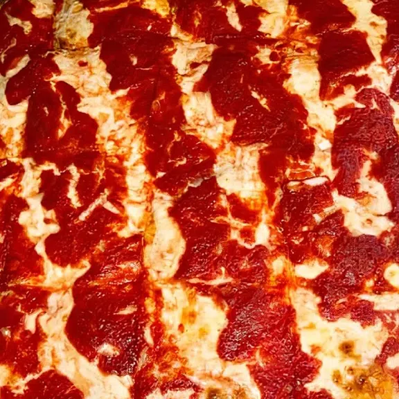 Classic pepperoni pizza with melted mozzarella cheese